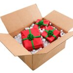 A shipping box full of wrapped presents.