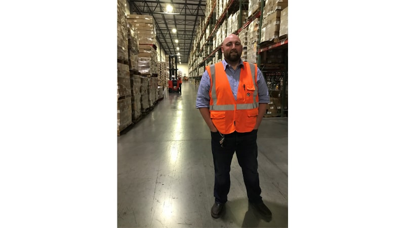 A picture of Mark Collum Jr, warehouse manager of the IDS Plainfield, Indiana fulfillment center.