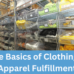 A row of warehouse storage baskets containing clothing items.