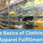 A row of warehouse storage baskets containing clothing items.
