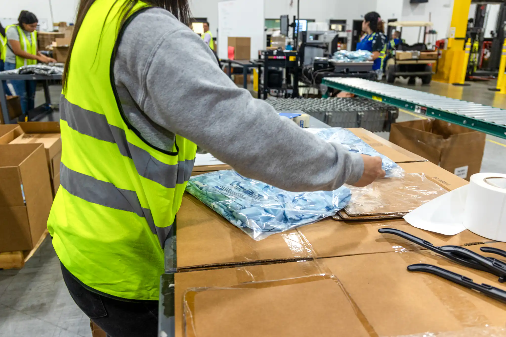 worker picking items at a fulfillment center