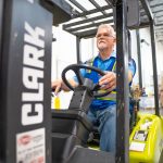 Fulfillment worker moving merchandise