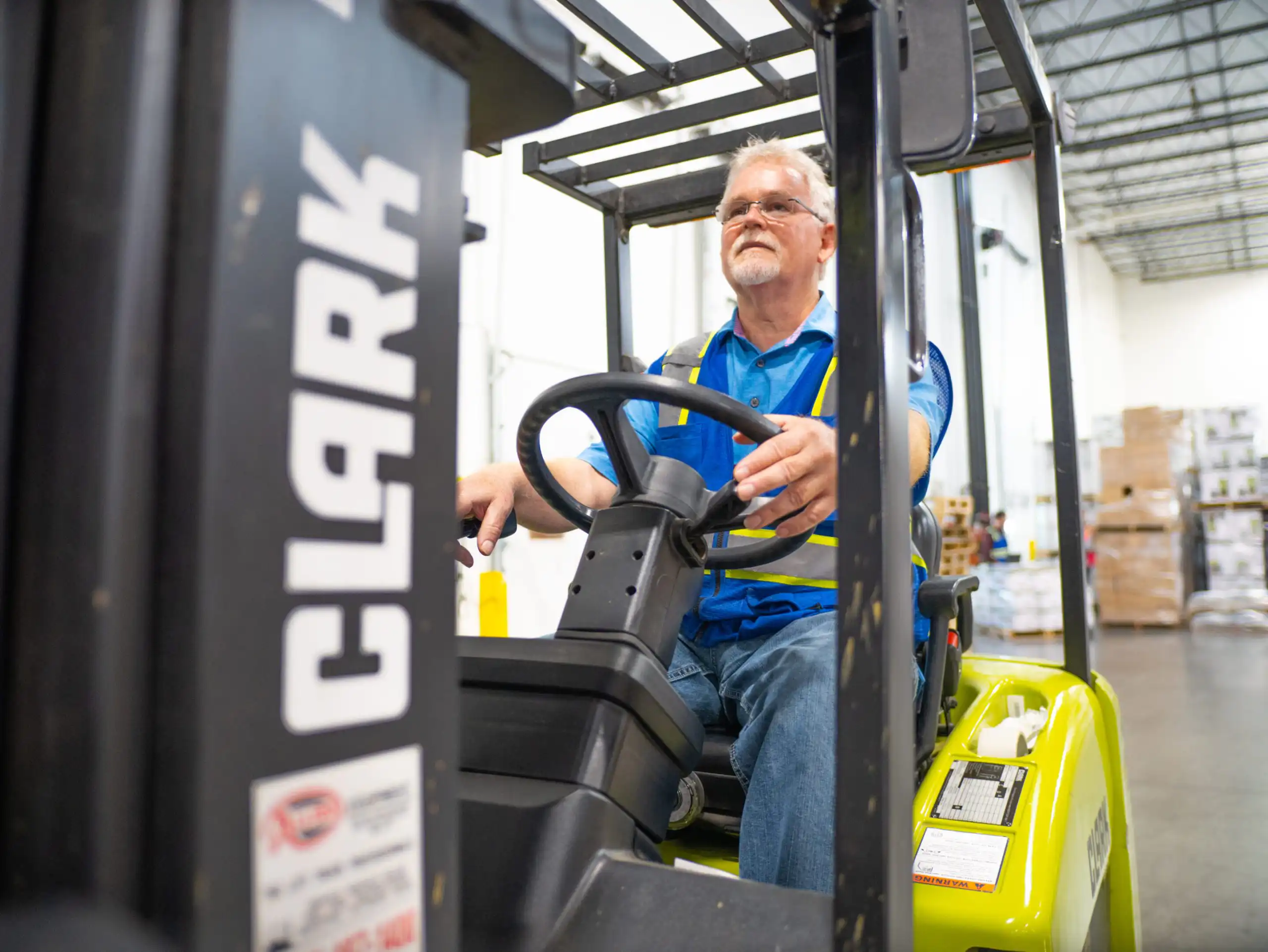 Fulfillment worker moving merchandise