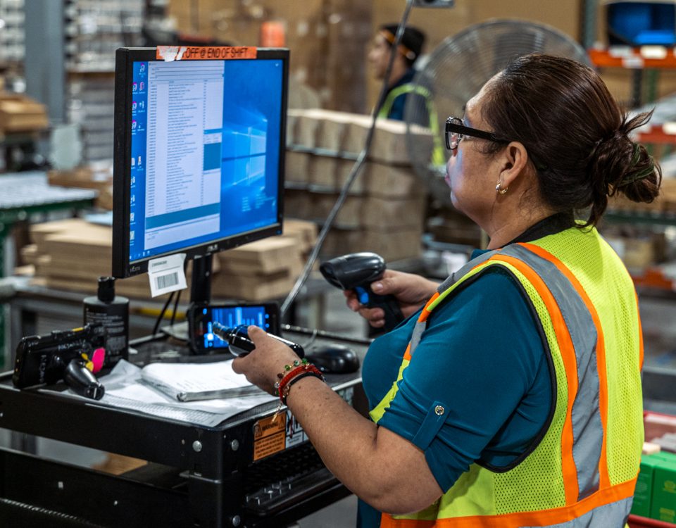 woman working in a fulfillment center