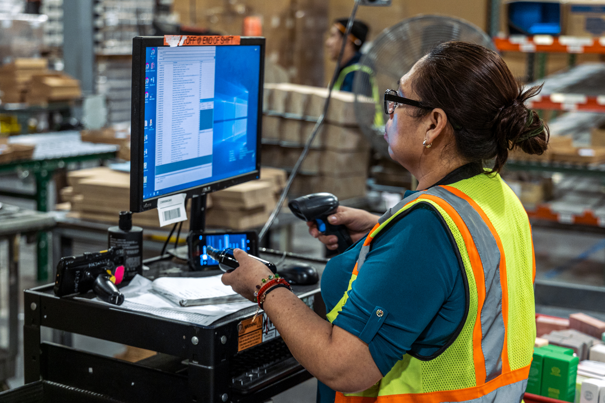 woman working in a fulfillment center
