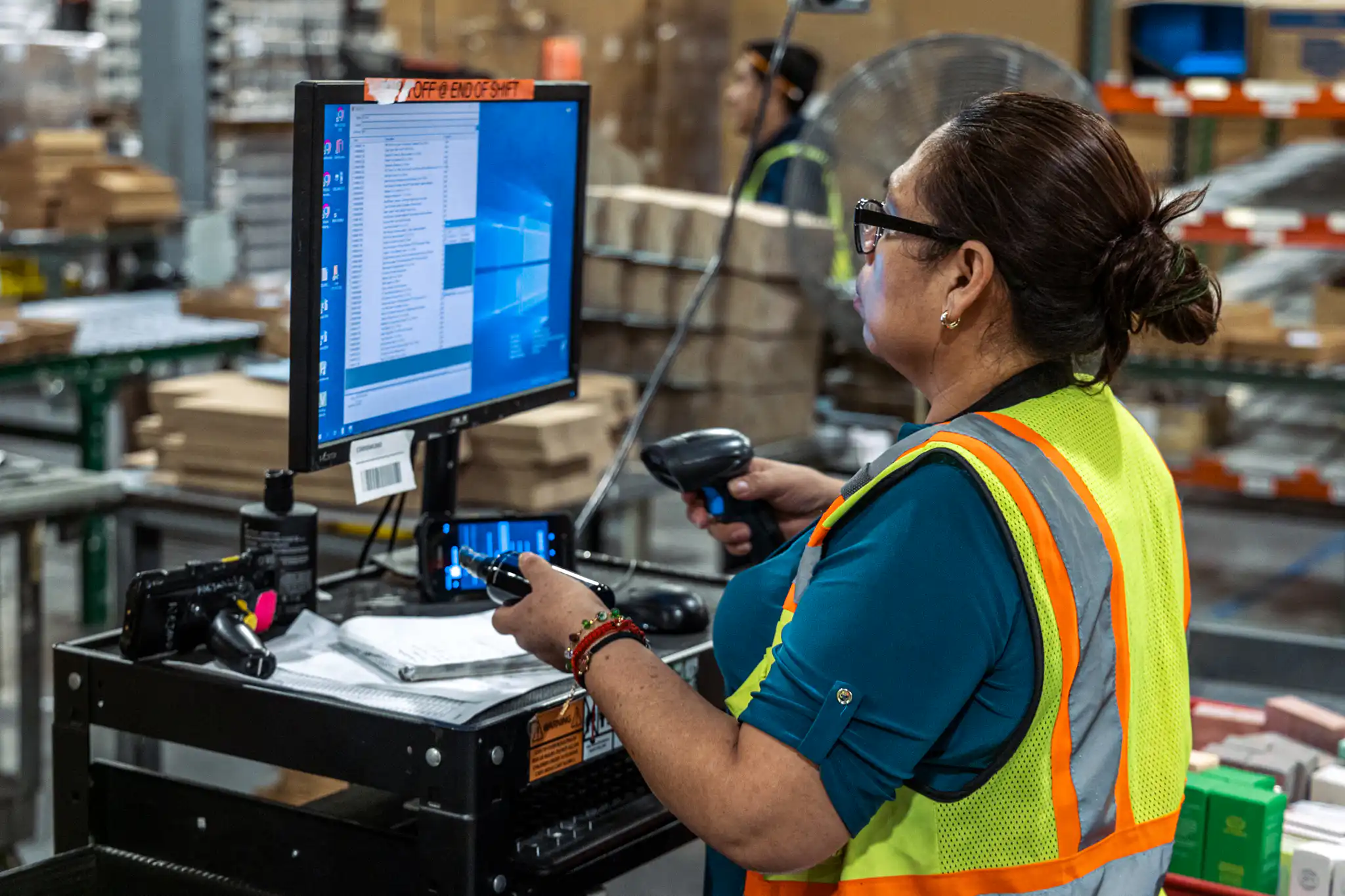 woman working in a fulfillment center