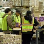 Fulfillment center workers fulfilling orders