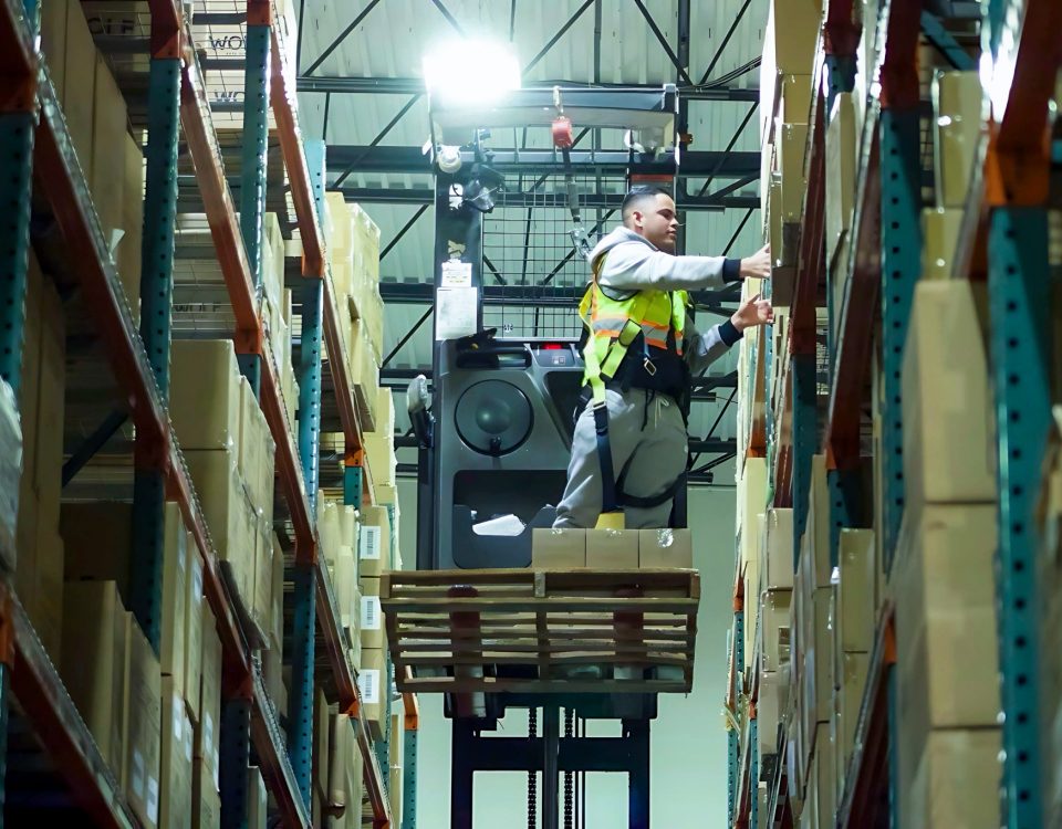 Fulfillment center worker on lift