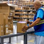 Man working in cosmetics fulfillment center